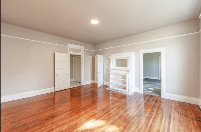 empty room with light hardwood / wood-style floors