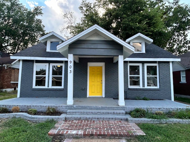 view of front facade featuring covered porch