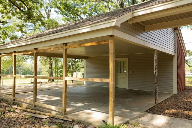 view of patio / terrace featuring a carport