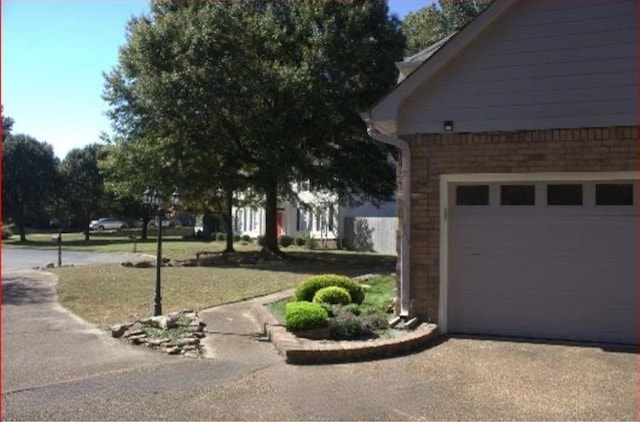 exterior space featuring a garage