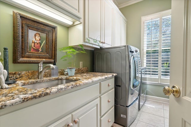 washroom featuring cabinets, plenty of natural light, sink, and crown molding