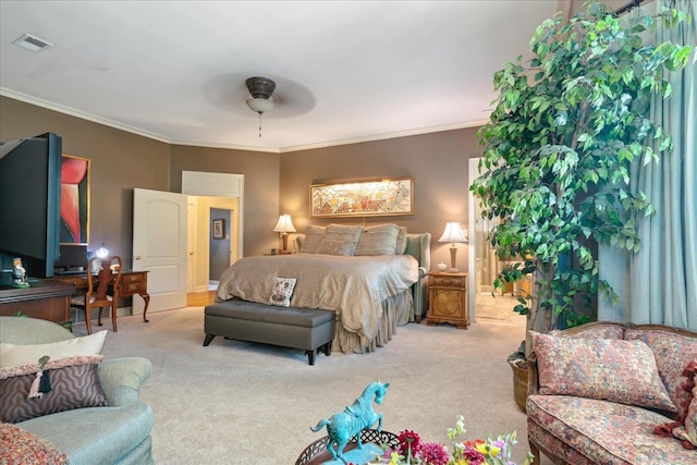 bedroom with ornamental molding, ceiling fan, and light colored carpet