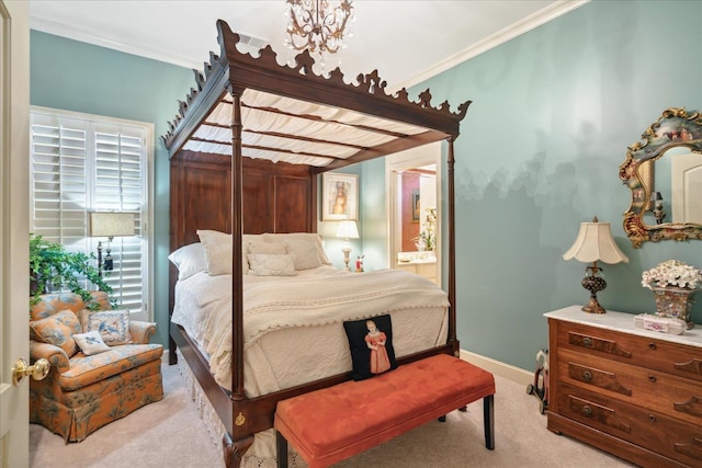 bedroom with light carpet, ensuite bath, and crown molding