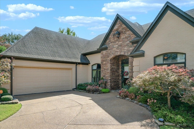 view of front of property with a garage