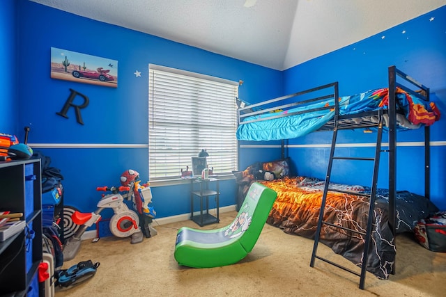 carpeted bedroom featuring a textured ceiling