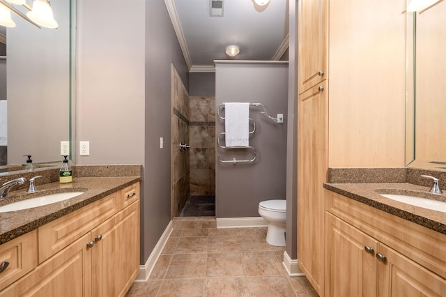21 Mina Ave Unit 207, Memphis, TN 38103 - full bath featuring two vanities, walk in shower, ornamental molding, toilet, and baseboards