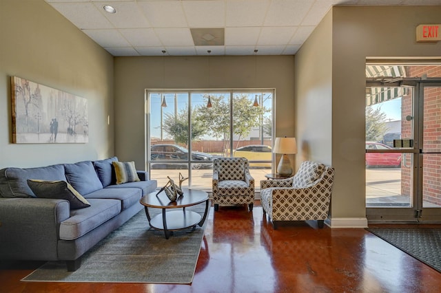 21 Mina Ave Unit 207, Memphis, TN 38103 - living room with a drop ceiling and concrete floors