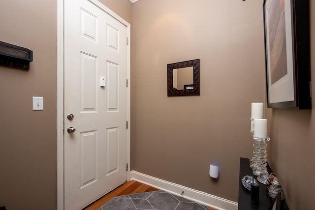 21 Mina Ave Unit 207, Memphis, TN 38103 - doorway featuring dark wood finished floors and baseboards
