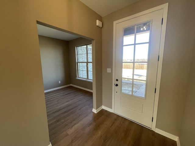 entryway with dark wood-type flooring