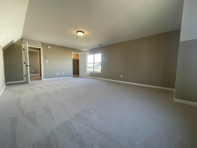 unfurnished bedroom with light colored carpet