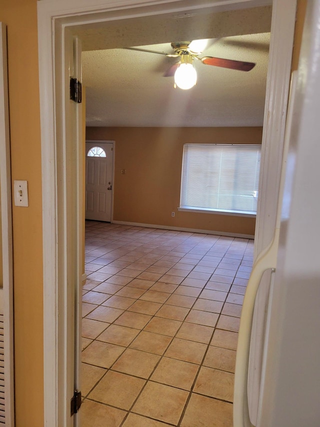 5273 Chatfield Dr Unit 5273, Memphis, TN 38116 - unfurnished room featuring light tile patterned floors, ceiling fan, and baseboards