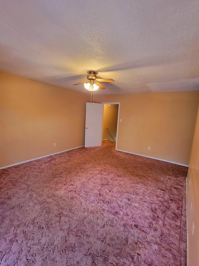 5273 Chatfield Dr Unit 5273, Memphis, TN 38116 - spare room with light carpet, a ceiling fan, a textured ceiling, and baseboards