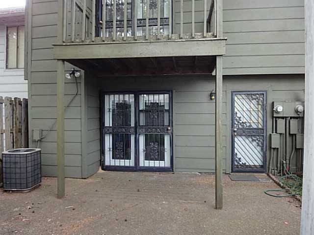 5273 Chatfield Dr Unit 5273, Memphis, TN 38116 - property entrance with a balcony, central AC, french doors, and fence