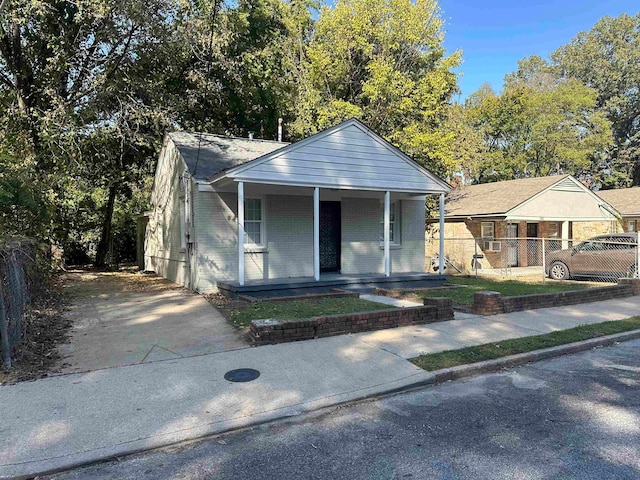 bungalow-style home with a porch