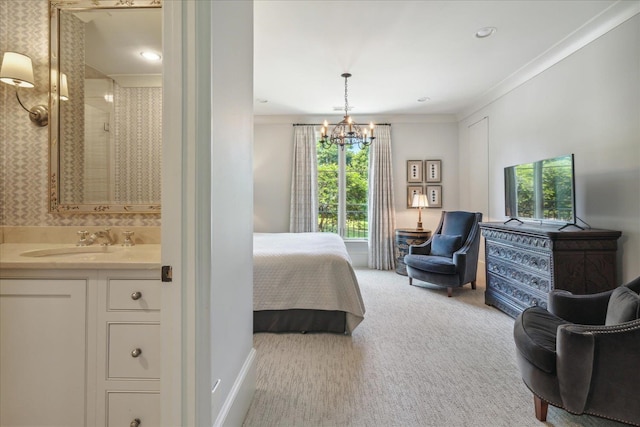 carpeted bedroom featuring a notable chandelier, crown molding, sink, and multiple windows