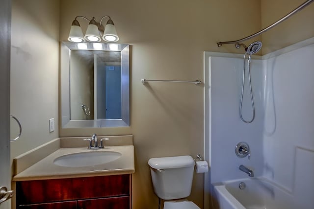 full bathroom featuring vanity, shower / washtub combination, and toilet