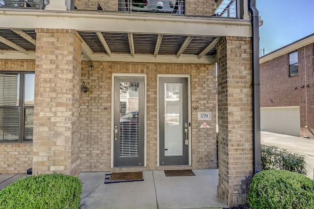 entrance to property featuring a garage