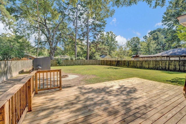 wooden deck with a yard