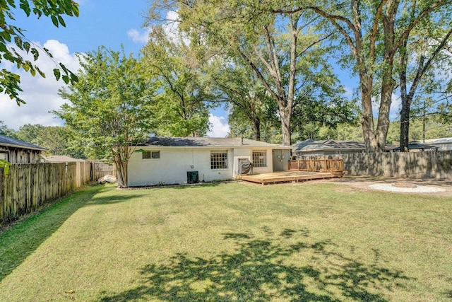 view of yard with a deck