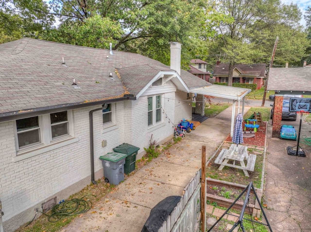 rear view of house with a patio