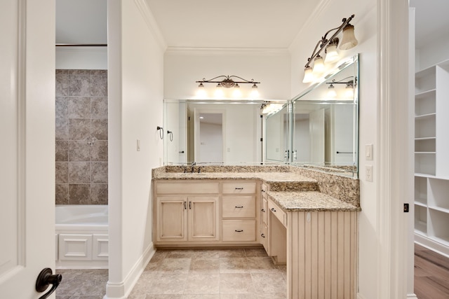 bathroom featuring a bath, crown molding, and vanity