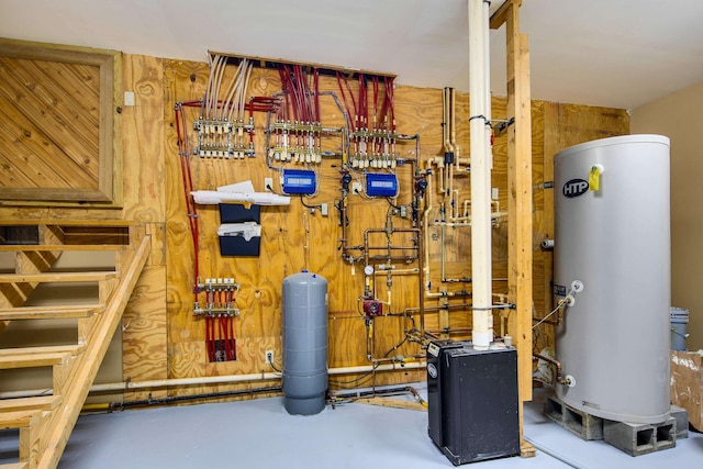 utility room featuring gas water heater