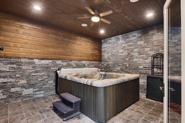 misc room with ceiling fan, wood ceiling, and a jacuzzi