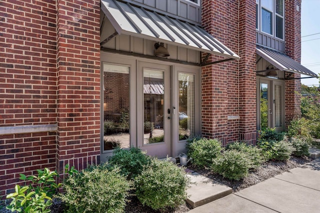 property entrance featuring french doors