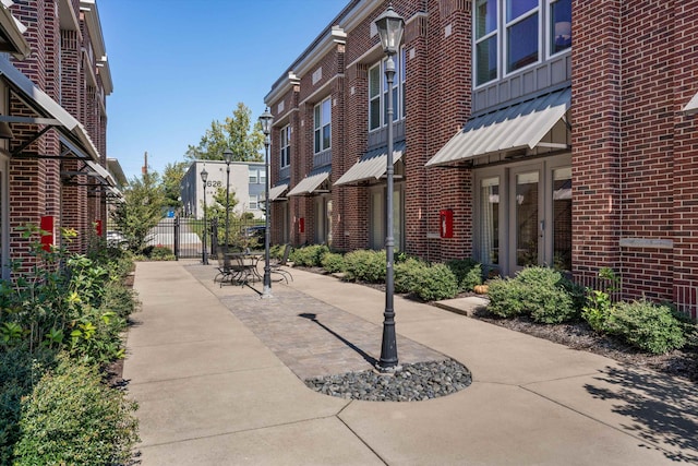 surrounding community featuring a patio area