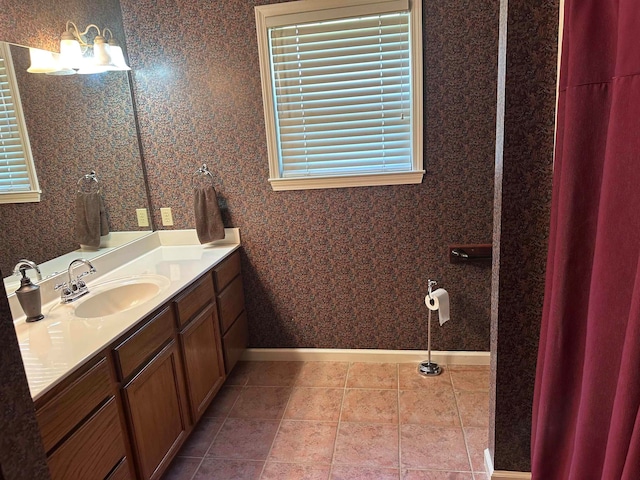 bathroom with vanity and tile patterned floors