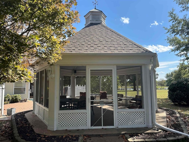 exterior space with a sunroom