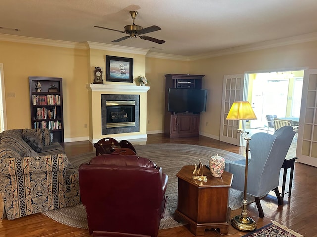 living room featuring ornamental molding and dark hardwood / wood-style floors