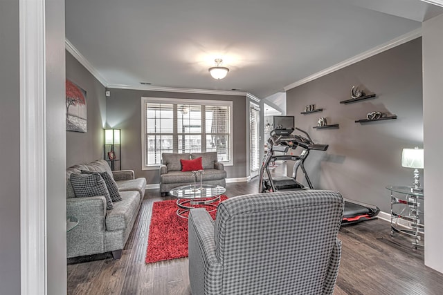 living room featuring hardwood / wood-style floors and crown molding