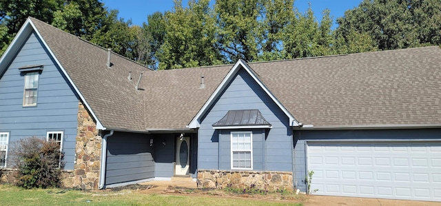 view of front of home with a garage