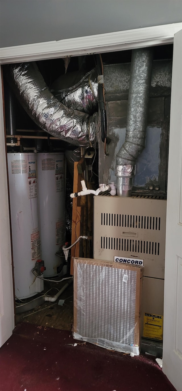 utility room featuring water heater