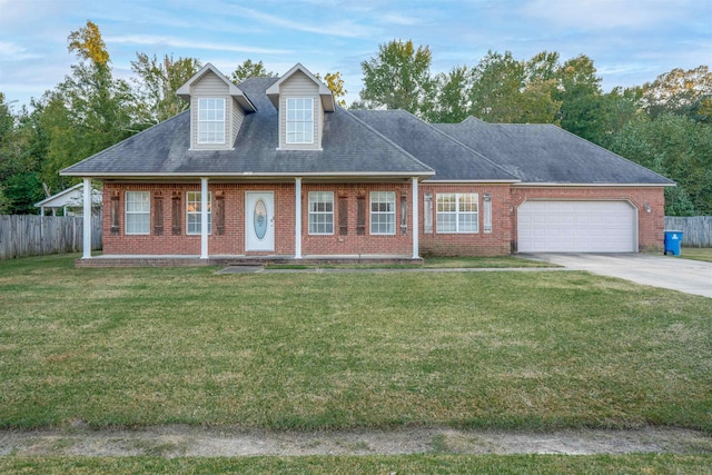 view of front facade featuring a garage and a front yard