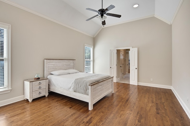 bedroom featuring multiple windows, dark wood-type flooring, crown molding, and ceiling fan