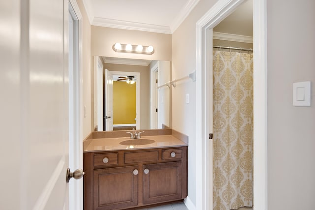 bathroom featuring vanity, crown molding, and ceiling fan