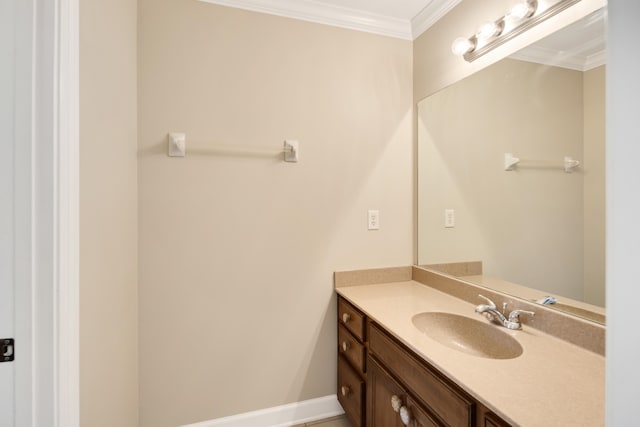 bathroom with vanity and crown molding