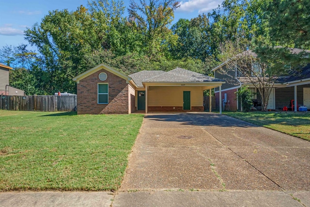 ranch-style house featuring a front yard and a carport