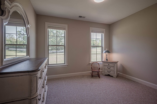 interior space featuring light colored carpet