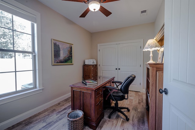 office area with hardwood / wood-style flooring and ceiling fan