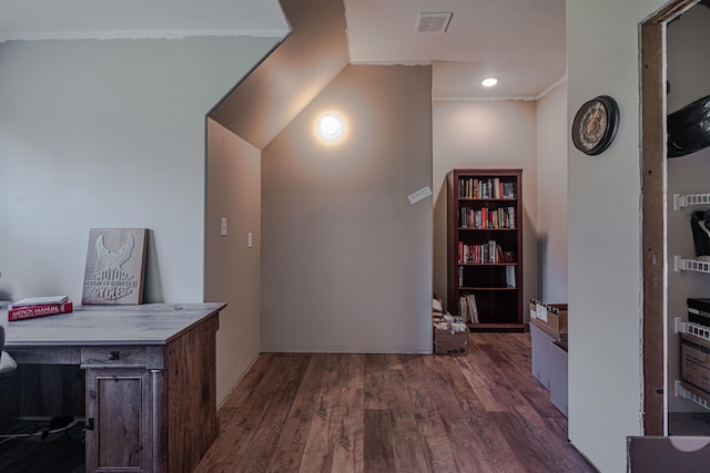 hall with ornamental molding and dark hardwood / wood-style floors