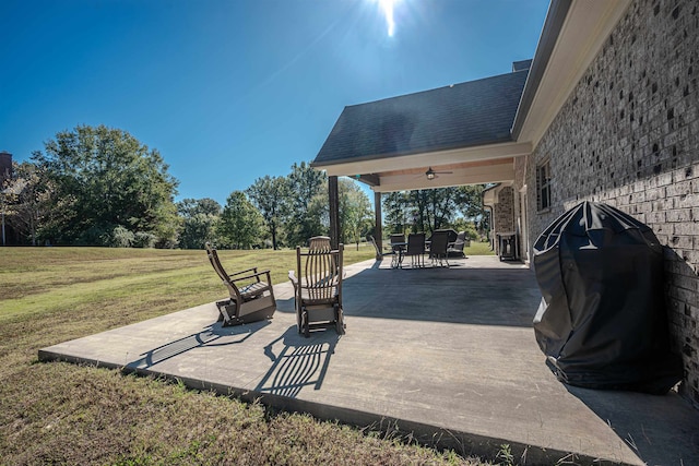 view of patio / terrace with area for grilling and ceiling fan