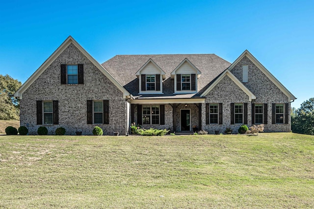 view of front of home with a front yard