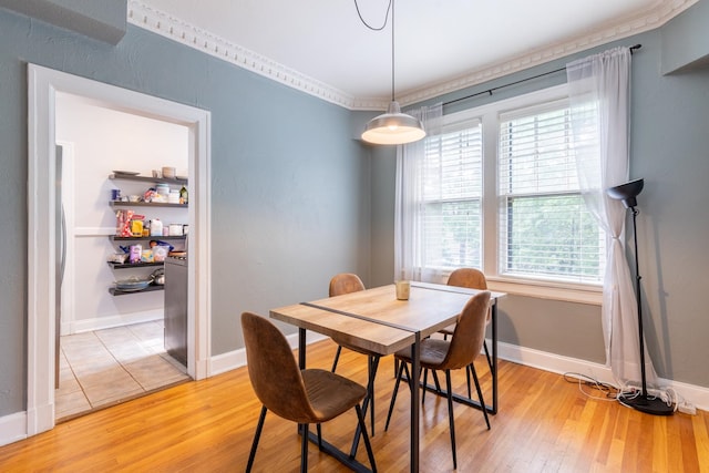 dining area featuring hardwood / wood-style floors and plenty of natural light