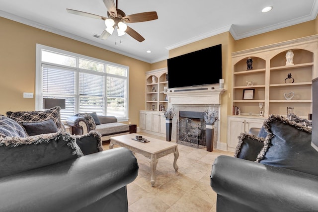 tiled living room with crown molding, a fireplace, and ceiling fan