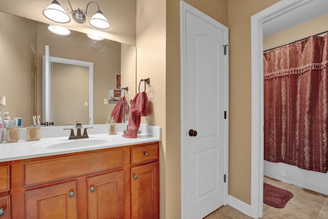 bathroom featuring vanity, tile patterned flooring, and a shower with shower curtain