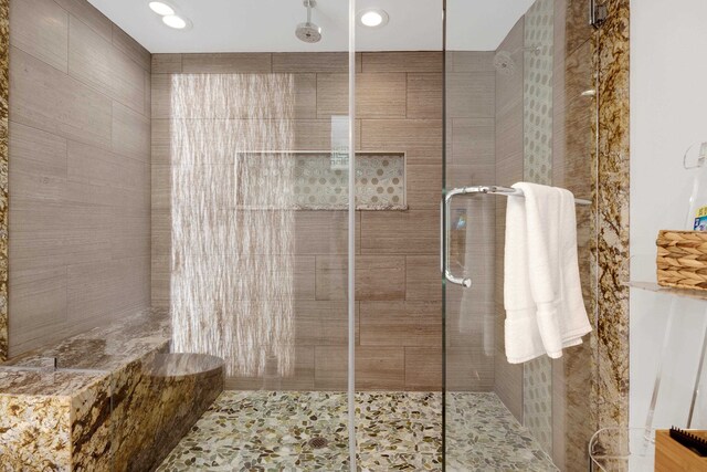 bathroom with an enclosed shower