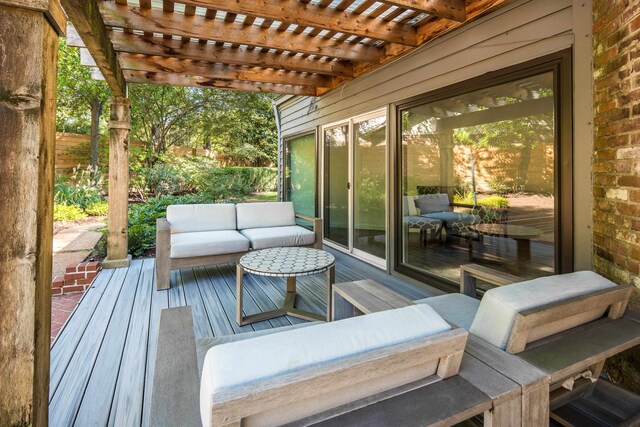 wooden deck featuring outdoor lounge area and a pergola